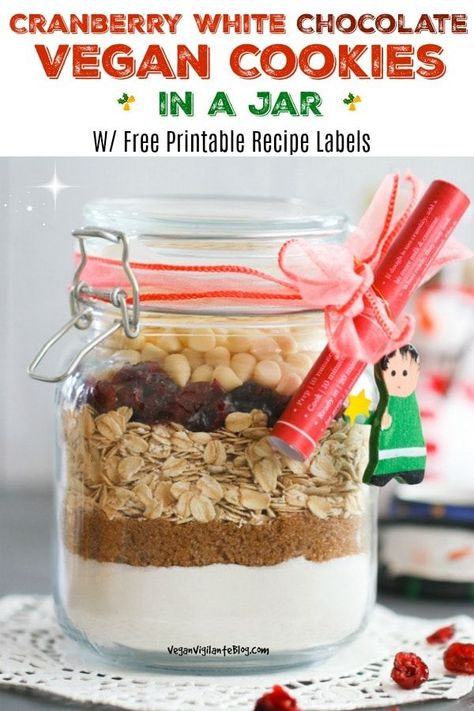 Looking for vegan cookies in a jar to give family & friends this holiday? These Cranberry White Chocolate Vegan Cookies in a Jar are easy to make & the perfect DIY Christmas gift. Vegan Christmas cookies in a jar come with free printable labels that include instructions on how to make the recipe. Festive, creative & tasty, too! #vegancookiesinajar #vegancookiesinajargift #freeprintablelabels #veganmasonjarcookies #veganchristmascookiesinajar #easy #vegancookiesinajarrecipe Christmas Cookies In A Jar, Cookies In A Jar, Cranberry White Chocolate, Vegan Christmas Cookies, Healthy Vegan Dinner Recipes, White Chocolate Cranberry Cookies, Mason Jar Cookies, Vegan White Chocolate, White Chocolate Cookies