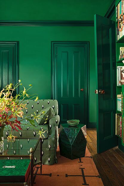 Further, paint sheen is used creatively, with walls in flat matte Amazon Moss 2037-10 contrasted with doors in semi-gloss Rainforest Foliage 2040-10. Jewel Tone Paint Colors, Rainforest Foliage, Stone End Table, Maximalist Painting, Modern Maximalism, Emerald Green Paint, Benjamin Moore Green, Maximalist Interior Design, Bold Paint Colors