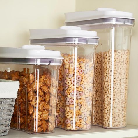 Keep your cereal fresher longer! Our BPA Free Good Grips POP Cereal Dispensers by OXO offer two airtight seals to keep cereal at its freshest, and their tapered design makes holding and pouring easy. Just push down on the back of the lid to open and push down at the front to close. Their rectangular shape maximizes space-efficiency in the pantry or on the counter. Off to college this fall? This is a perfect food storage container for your dorm room. Oxo Containers, Desain Pantry, Cereal Containers, Cereal Dispenser, Kitchen Organization Pantry, The Home Edit, Airtight Food Storage Containers, The Container Store, Kitchen Cabinet Organization