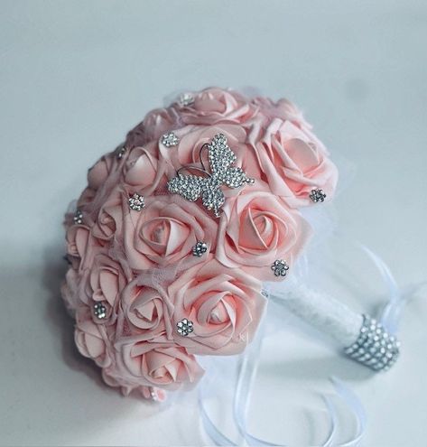 This pretty blush pink bouquet is approximately 9 inches in diameter and 9 inch tall. It is filled with real touch roses and accented by a large irridescent butterfly brooch and coordinating irridescent stones on each petal. This bouquet is perfect for First Communion, Flower Girl and as a Quince bouquet. The flowers are real touch roses which travel well and crush resistent. This bouquet will make a wonderful keepsake of her special day. Bouquets are sent via USPS Ground Advantage which takes between 2-5 business days for delivery. If you need to have your packages signed for, kindly anticipate there is a post office charge of $3.50 for "Signature Required" service. Thank you for looking at our shop and Congratulations on this very special occasion. Original design. Rose Pink Aesthetic, Pink Quinceanera Bouquet, Pink Quinceanera Ramo, Pink Ramos Quince, Quinceanera Flower Bouquet Pink, Quince Flower Bouquets Pink, Quinceanera Bouquet, Roses Bouquet Gift, Quinceanera Pink