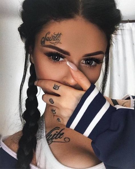 Face tattoos are unquestionably for courageous people since they are one of the most contentious styles of body art. Tattooed Bodies, Small Face Tattoos, Spinal Tattoo, Face Tats, Face Tattoos For Women, Romantic Tattoo, Girl Face Tattoo, Tattoos For Black Skin