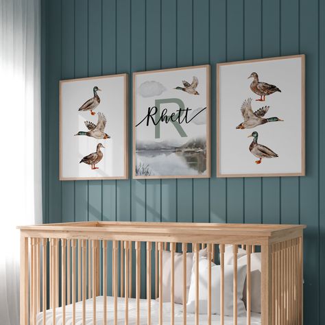 **FRAMES NOT INCLUDED** Introducing our Personalized Duck Hunting Nursery Art Print, a delightful and charming addition to any child's room or nursery. This custom duck decor is designed to inspire your little one's imagination and bring a touch of outdoor adventure into their space. It also makes a perfect baby gift for those who love nature and hunting. Each art print is meticulously crafted with care and attention to detail. The design features a serene fishing scene, complete with a whimsical fishing rod, bobber, and a friendly fish ready to be caught. The personalized touch comes in the form of your child's name, beautifully integrated into the artwork, making it truly one-of-a-kind. Our nursery art prints are printed on high-quality archival paper, ensuring vibrant colors and excepti Fishing Themed Nursery Cabin, Hunting Fishing Theme Nursery, Fishing Themed Boys Room, Nursery Ideas Fishing, Fly Fishing Nursery Theme, Baby Boy Fishing Nursery Themes, Fishing Theme Bedroom Boys, River Theme Nursery, Boys Bedroom Fishing Theme