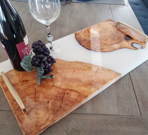 Charcuterie Serving Board | Serving Tray | Epoxy resin board A note from the maker: Made to Order-Choose your colour Our handmade, wooden, charcuterie board made from elm and epoxy. These unique epoxy river boards have been planed, meticulously cut and joined to make a unique and beautiful multi-purpose board. This board can be used as a serving tray, charcuterie board or just so beautiful you’ll want to display it on your counter. Charcuterie Resin Board, Epoxy Cheese Board, Charcuterie Board Ideas How To Build Diy, Charcuterie Board Utensils, Charcuterie Board With Epoxy, Wood Charcuterie Boards, Epoxy Charcuterie Board Diy, Wooden Resin Tray, Epoxy Board Ideas