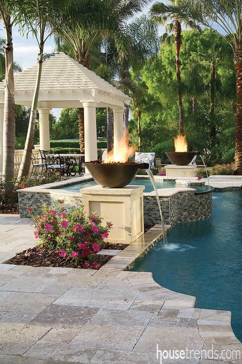 Fire bowls around a swimming pool double as water features Living Pool, Luxury Swimming Pools, Pool Landscape Design, Pool Waterfall, Luxury Pools, Dream Pools, Backyard Pool Designs, Beautiful Pools, Swimming Pools Backyard