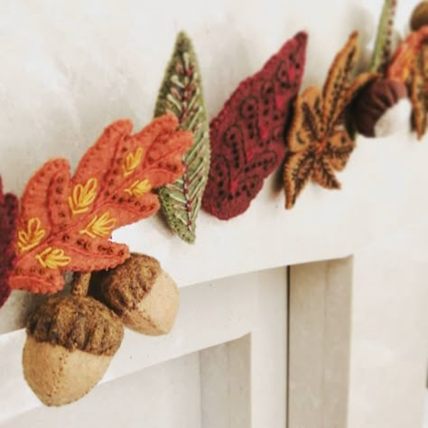 Featured in Love Embroidery magazine issue 43, August 2023  Decorate your fireplace for autumn with our cosy embroidered seasonal felt garland. Playful conkers and acorns nestle among vibrant leaves of maple, chestnut, oak, beech and willow. Each leaf is beautifully embroidered to one of five distinctive designs. Using just simple embroidery techniques, you can create your own piece of stylish home décor.  This PDF download of our Craft Instruction Booklet includes all the information you need to begin crafting today. Use your download onscreen or print in A4 to have as a handy A5 booklet. This Digital File Contains: Full, detailed instructions Illustrated Stitch Guide Full Size Templates List of materials required Thread shade numbers (Anchor & DMC threads) Level: Intermediate Suitability Felt Maple Leaf, Felt Leaf Garland Autumn, Felt Autumn Garland, Cosy Autumn Decor, Autumn Felt Garland, Winter Felt Garland, Felt Fall Decor, Embroidery Garland, Autumn Diy Crafts