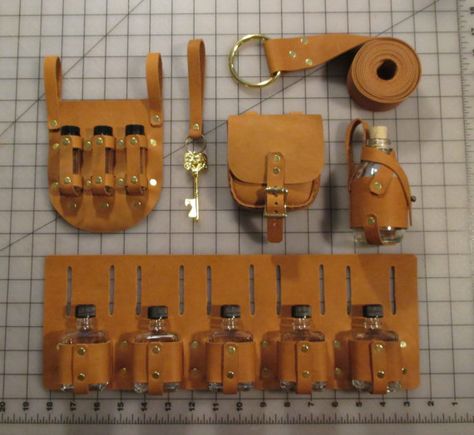 Every adventurer needs the proper adventuring gear. To that end, we are offering the following kit, done in orange-tan cowhide leather with brown stitching and brass fittings: One (1) leather belt, with brass-plated ring and rivets. The belt is 1.5 wide and will fit up to a 50 waist. One (1) small leather pouch, with leather strap closure and brass-plated rivets. It is roughly 4 wide across the top, 4 tall, and roughly 1.25 thick. One (1) leather-harnessed glass potion bottle, with brass bu... Alchemist Belt, Alchemist Accessories, Fantasy Props, Steampunk Accessories, Tan Cowhide, Cosplay Diy, Potion Bottle, Fantasy Costumes, Brass Fittings