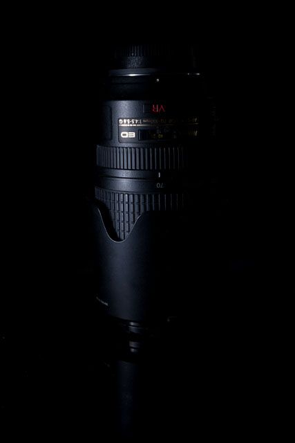 Low key photo of a camera lens, where a piece of polystrene was used to block the light from hitting the background. Low Key Product Photography, Key Light Photography, Low Key Photo, Chiaroscuro Photography, Low Key Lighting, Key Photography, Low Key Photography, Photography Lighting Setup, Photo Lessons