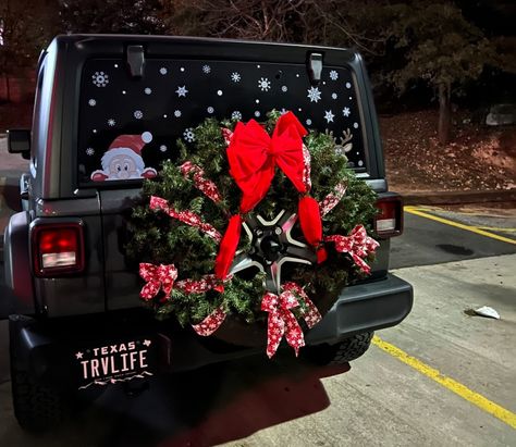 Custom Wrapped Jeep Wrangler, Jeep Wrangler Christmas Wreath, Jeep Decorated For Christmas, Christmas Jeep Tire, Christmas Car Decor Ideas, Decorating Jeep For Christmas, Jeep Wreath Christmas, Jeeps Decorated For Christmas, Christmas Jeep Wrangler