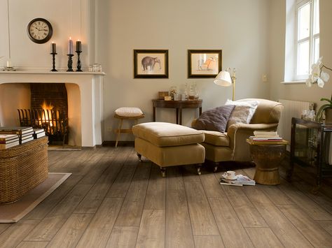 Quick-Step Laminate Flooring - Impressive 'Scraped oak grey brown' (IM1850) in a classic living room. To find more living room inspiration, visit our website: https://www.quick-step.co.uk/en-gb/room-types/choose-the-perfect-living-room-flooring #salon #woonkamer Brown Laminate Flooring, Grey Laminate Flooring, Quick Step Flooring, Brown Laminate, Waterproof Laminate Flooring, Best Laminate, Oak Laminate Flooring, Grey Laminate, Quickstep