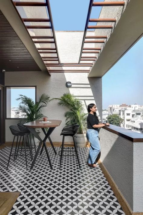 An Eye Striking Facade Captures The Spectator’s Vision Created From Earthy Material Palette Of This Residence | Manoj Patel Design Studio - The Architects Diary Roof Terrace Design, Terrace Tiles, Terrace Floor, Wallpapers Home, Balcony Flooring, Modern Balcony, Brick Cladding, Terrace Garden Design, Terrace Decor