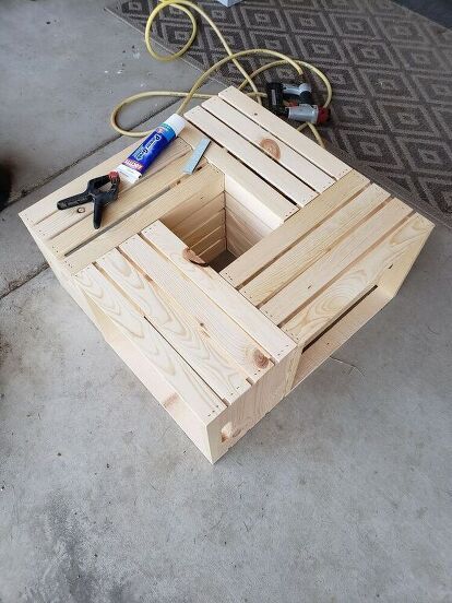 A neighbor asked me if I could make her a simple outdoor table from some crates she had purchased. Always up to the task I said yes. She brought them over and I immediately got to work. Here is the final project. I like to post the end result first so that you will have a idea of what I'm doing along the way. It is so simple to make so please don't hesitate to try it yourself. First thing was I started with four (4) crates. These can be any size as long as they are rectangular… Diy Outdoor End Table, Simple Outdoor Table, Diy Crate Coffee Table, Outdoor End Table, Make Your Own Coffee, Crate Coffee Table, Crate Table, Diy Crate, Wood Insert