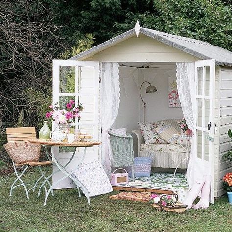 Shabby-chic is a style that works equally well outside. Simply give a shed or summerhouse a coat of white paint, add some salvaged garden furniture and heap with cushions, throws and blankets in soft faded florals