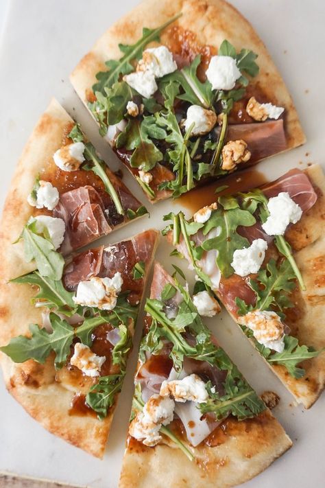 Easy flatbread with prosciutto, fig jam, goat cheese, and arugula. Easy lunch idea. Flatbread Prosciutto Arugula Pizza, Fig Jam Pizza, Cheese Flatbread Pizza, Fig Flatbread, Prosciutto Arugula Pizza, Wine Tasting Food, Fig Pizza, Goats Cheese Flatbread, Naan Pizza Recipes