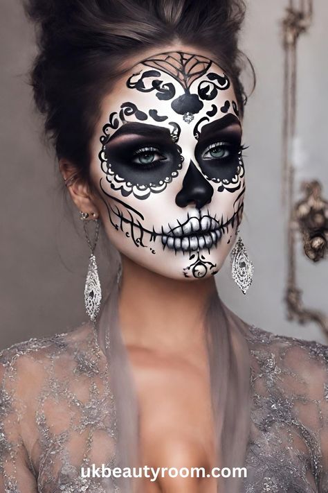 Sugar skull makeup is a colorful and artistic face painting style inspired by the Mexican holiday, Día de los Muertos (Day of the Dead). It involves using bright colors, white and black paint to create designs on the face that resemble ornate sugar skulls. This post list 17 pretty sugar skull makeup ideas you can create at home. easy, pretty, tutorial, easy simple, for men, half, kids easy, DIY, for men with beards, half face, step by step Candy Skull Makeup Halloween, Painted Skeleton Face, Katrina Face Painting, Glam Skull Makeup Halloween, Diy Skeleton Face Paint, Day Of The Dead Makeup Kids, Mens Halloween Makeup Easy, Dia De Los Muertos Face Paint Ideas, Face Paint Ideas Adults