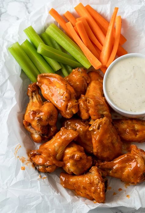 Saucy Buffalo Wings in basket with celery and carrots and a side of ranch dressing Essen, Baked Buffalo Wings, Hot Chicken Wings, Buffalo Hot Wings, Baked Chicken Wings Oven, Crispy Oven Baked Chicken, Big Dinner, Chicken Breast Recipes Baked, Oven Baked Chicken Breasts