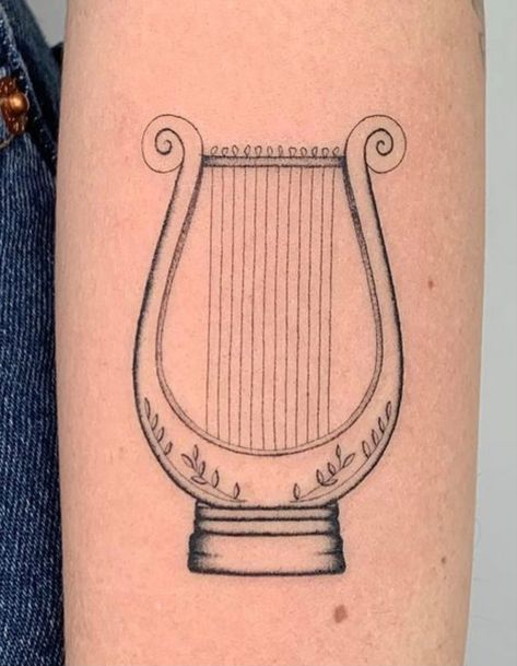 Apollo Tattoos Greek God, Light Academia Tattoo Ideas, Lyre Tattoo Orpheus, Lyre Tattoo, Song Of Achilles Tattoo, Harp Tattoo, Achilles Tattoo, Hermes Tattoo, Apollo Tattoo