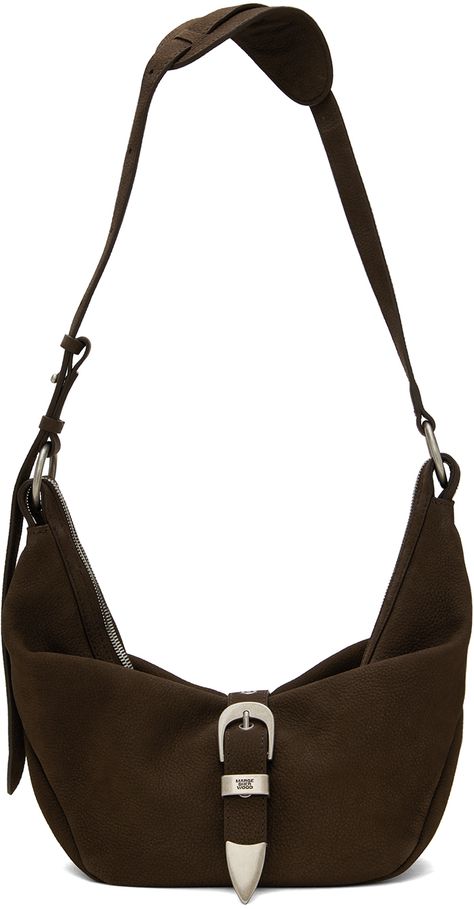 Grained nubuck shoulder bag in brown. · Adjustable shoulder strap · Magnetic pin-buckle flap · Two-way zip closure · Patch pocket at interior · Logo-woven twill lining · Logo-engraved antiqued silver-tone hardware · H8 x W14.5 x D3.75 Supplier color: Hush nubuck Large Cross Body Bag, Margesherwood Bag, Marge Sherwood, Marge Sherwood Bag, Suede Bag, Interior Logo, Shopping Totes, Medium Backpack, Brown Belt