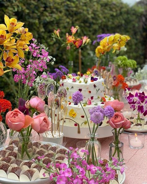 Flowers Dessert Table, Birthday Party Flower Decoration, Table Of Desserts, Spring Flower Party Decorations, Colorful Flower Birthday Theme, Dessert Table Garden Party, Eclectic Birthday Decor, Flower Theme Bday Party, Flower Decor For Party