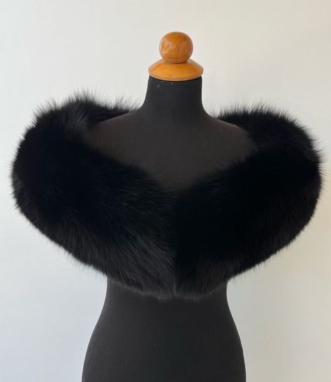 All our garments are brand new, handmade, unused and high quality craftsmanship from genuine material. They have been processed through a professional cleaning. Nothing is reused or recycled. Details: * Real fox fur stole bolero * Handmade * Back side satin lining  * Black color * Made of whole fox pelts * High quality craftsmanship * Eye hook closure * Dimensions: Lenght: 110cm - 43,3inch                          Width: 16cm - 6,3inch * Made in Greece. The real color of the item may be slightly Noir Fashion, Bolero Black, Fox Stole, Fur Sleeves, Fur Bolero, Black Fur Coat, Furano, Black Fox, Fabulous Furs