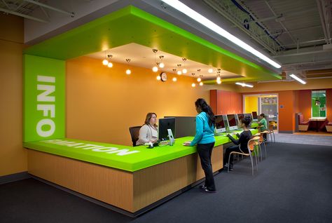 Circulation desk with bold graphics. [Wight & Company... visit us at wightco.com] Pediatric Waiting Room Ideas, Children Hospital Design, Circulation Desk, Front Desk Design, School Reception, Office Reception Design, School Office Decor, Classroom Interior, Daycare Decor