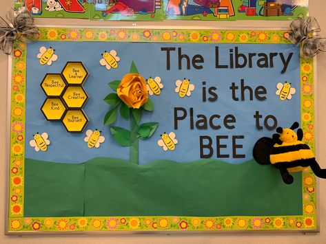 Library Is The Place To Bee, Easter Library Display Ideas, Bee Library Display, Easter Library Displays, Bee Display, Library Doors, Bee Bulletin Boards, School Library Book Displays, Res Life Bulletin Boards