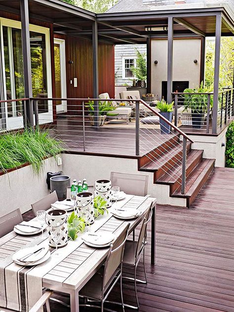 The two-tiered design welcomes backyard views and casual gatherings: http://www.bhg.com/home-improvement/deck/ideas/deck-photos/?socsrc=bhgpin060114alfrescodining&page=10 Decking Designs, Design Per Patio, Multi Level Deck, Terrasse Design, Deck Makeover, Deck Pictures, Modern Deck, Backyard Views, Patio Deck Designs