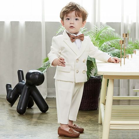 Boys' 3-Piece Tuxedo Set with Dress Shirt, Jacket, and Pants - 90cm Button closure YOUR SON WILL LOVE IT: This kids tuxedo can be used for a boy ring bearer outfit or a wedding suit for boys GREAT VALUE: This tuxedo for boys comes with 3 pieces. 1 button dinner jacket, shirt, pants GOOD QUALITY: This kid tuxedo is made with 100% polyester; the shirt is made with 65% polyester 35% cotton; Pleats on the long sleeve tuxedo shirt; CLASSIC AND FASHIONABLE: This tuxedo for boys is a modern twist based Formal Boys Outfit, 1st Birthday Outfit Boy, Wedding Outfit For Boys, Boys Birthday Outfits, Kids Dress Boys, Wedding Dresses For Kids