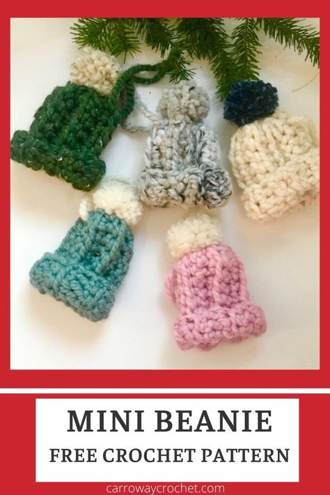 Little crochet mini beanies laying near evergreen branches. Beanie Ornament, Crochet Christmas Baubles, Carroway Crochet, Mini Beanie, Ornament Crochet Pattern, Mini Beanies, Ornament Crochet, Crochet Christmas Ornaments Free, Crochet Ornament Patterns