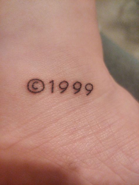 Ankle tattoo, it has a © followed by the year 1999. I was born then :) 1999 Tattoo, Date Tattoos, Cool Arm Tattoos, 23rd Birthday, Arm Tattoos, Arm Tattoo, Paw Print Tattoo, Jesus Fish Tattoo, Tattoos For Guys