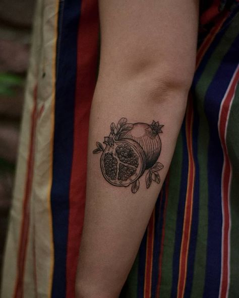 Small palm sized pomegranate etching fineline tattoos blackwork tattoo of pomegranate fruit vintage illustration on arm tattoo by Alexandyr Valentine Tantalus Tattoo, Realism Fruit Tattoo, Vintage Pomegranate Illustration, Persephone Tattoo Minimalist, Orange Fruit Tattoo Black And White, Pomegranate Tattoo Meaning, Persephone Inspired Tattoo, Tattoos Inspired By Movies, Small Pomegranate Tattoo