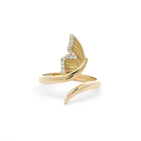 Transform into a graceful butterfly with our Butterfly Open Ring. Adorned with dazzling cubic zirconia stones, this wrap ring adds a touch of elegance to any outfit. Made with high-quality 14k yellow gold, it's the perfect accessory for any occasion. Fly away with style and sophistication! Metal: 14k Gold Stone: Cubic Zirconia Type: Ring Size: 7.5 & 9 Available We size up to two sizes free of charge. Please contact us for pricing on resizing more than two sizes. We need 2-3 business days to resi Butterfly Rings Jewelry, Butterfly Engagement Ring, Gold Thumb Rings, Butterfly Jewellery, Butterfly Rings, Gold Butterfly Ring, Diamond Jewelry Earrings, Open Rings, Fancy Jewellery Designs