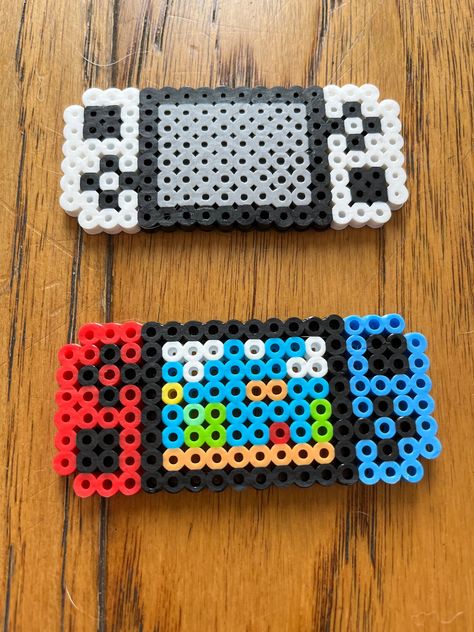 Handmade perler bead designs created by a 9 year old who loves to craft! Perler Bead Bouquet, Cars Perler Beads, Outer Banks Perler Beads, Fall Melty Beads, Shadow Perler Beads, Perler Bead Patterns Square, Teacher Perler Bead Patterns, Mexican Perler Bead Patterns, Disney Melty Beads