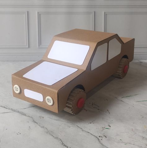 Cardboard craft Car Made Out Of Cardboard Boxes, Cardboard Car Ideas, How To Make A Cardboard Box Car, Surprise Auto, Cardboard Car Diy, Car Out Of Cardboard, Diy Cardboard Car, Car From Cardboard, Car Cardboard