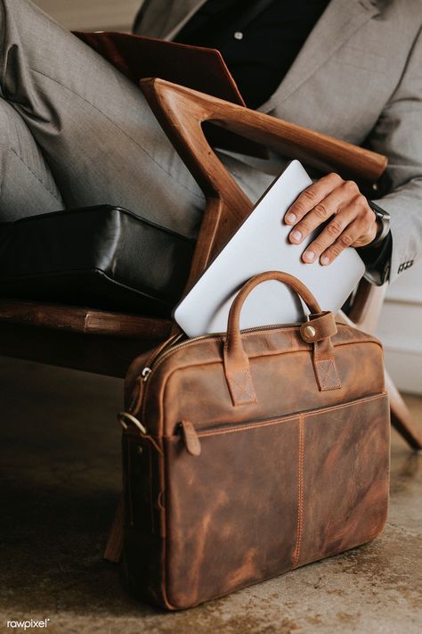 Classy businessman putting his laptop in his brown leather bag | premium image by rawpixel.com / Felix Vintage Briefcase, Unique Products Design, Brown Leather Bag, Leather Laptop, Brown Aesthetic, A Chair, Luxury Vintage, Personal Branding, Business Man