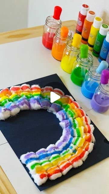 MamaBee👑 on Instagram: "A cute rainbow craft 🌈 

Add some acrylic paint to some water. We used jumbo eyedroppers to drip the paint onto the cotton ball rainbow.

Also, how cute are these tiny little mason jars that I scored at the @dollartree

For more rainbow craft ideas, check out…

@mamasbusybees 
@magicaladventuresandmoreco 
@chels2983 
@threepeasfinds 
@sweetpinklemons 
@sincerely.schwartz 
@beagsandbubs 
@playandread.together 
@luckylittlepennycrafts 
@frassatihomeschooling 
@littlelovebox_ny 
@megjohnsonfamily

Loop hosted by @motherhoodcreatives #motherhoodcreatives

#toddlercrafts #toddlerartsandcrafts #rainbowart #craftsforkids #finemotorskillsactivities #rainbow #stpatricksdaycrafts #artfortoddlers #artoftheday #toddleractivities #activitiesfortoddlers #activitiesforkids #insp Cotton Balls Crafts, Rainbow Activity Preschool, Rainbow Art For Toddlers, Rainbow Craft Preschool, Rainbow Art Preschool, Rainbow Painting For Kids, Rainbow Activities Preschool, Cotton Ball Activities, Cotton Ball Painting