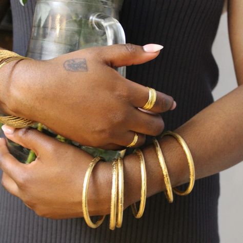 A fully rounded bangle has arrived to the site! I've been really trying to find a way to make a nice substantial bangle and I think this is it! This bangle is named after my paternal aunt, the oldest of my father's siblings, who happened to transition a few years back on my birthday. She was a stern woman who played no Gold Bangles Black Women, Gold Bangles Aesthetic, Stern Woman, Bangles Aesthetic, Single Bangle, Gold Bangle Bracelets, Lots Of Jewelry, Bangles And Bracelets, On My Birthday