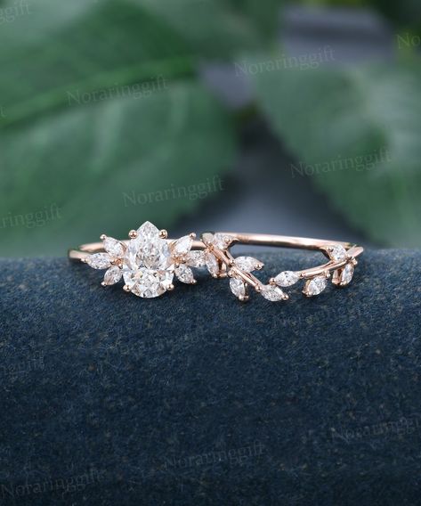 Pear shaped Lab grown Diamond engagement ring set vintage Unique rose gold Leaf Branch ring Marquise Moissanite Cluster wedding Bridal ring -----Ring Information----- Engagement ring +Center stone: Lab grown Diamond +Color: DEF +Clarity: VS +Cut type: Pear shaped Approx weight: 1.1 ctw +Side Stone: Natural Diamonds or Moissanite Approx weight: 0.3ctw Wedding band  +Stones: Natural Diamonds or Moissanite Approx weight: 0.31ctw Metal : Solid 14k/18k yellow gold white gold or rose gold, other metal Flower Rings Engagement, Pear Cluster Engagement Ring, Gold Pear Engagement Ring, Gold Leaf Engagement Ring, Nature Inspired Engagement Rings, Gold Opal Engagement Ring, Marquise Wedding Ring, Floral Wedding Ring, Nature Engagement Ring