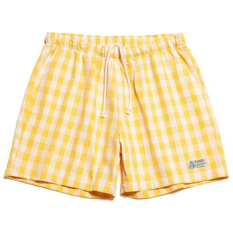 LANI'S General Store  Short Length Palaka Shorts. Palaka is fabric used for those who worked in the plantations during the early 19th century Hawaii. In 1930's Palaka shirts with blue jeans became popular Hawaiian style loved by the locals. ［About Item］ Unisex short length palaka shorts. ・Color: Yellow ・Elastic waist band with drawstring ・Side pockets ・100% Cotton ・Made in Hawaii U.S.A.  - Size - XS (28-29inch) inseam : 4 1/2" S (30-31inch) inseam : 5" M (32-33inch) inseam : 5 1/2" L (34-35inch) Yellow Cotton Summer Shorts, Cute Yellow Shorts, Yellow Cotton High-waisted Shorts, Yellow Cotton Jean Shorts, Cheap Yellow Playwear Shorts, Hawaii Usa, General Store, Hawaiian Style, Unisex Shorts