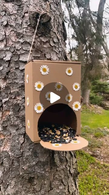 Tara Rondinelli on Instagram: "The sweetest spring bird feeder🥰 I suggest using homemade/edible glue for the pressed flowers to avoid toxins♥️ Have any questions about how to make it? Let me know your questions below!  #cardboardcrafts #reducereuserecycle #springcrafts #springcraftsforkids #diybirdfeeder #birdfeedercraft #forestschool #naturepreschool #kidscrafts #craftsofinstagram" How To Make Bird Feeders Homemade, Birds Feeders Homemade, How To Make Bird Feeders, How To Make A Bird Feeder, Diy Bird Feeders Homemade, Bird Feeders Diy Homemade, Bird Feeders Diy Kids, Bird Feeders Diy, Homemade Bird Feeder