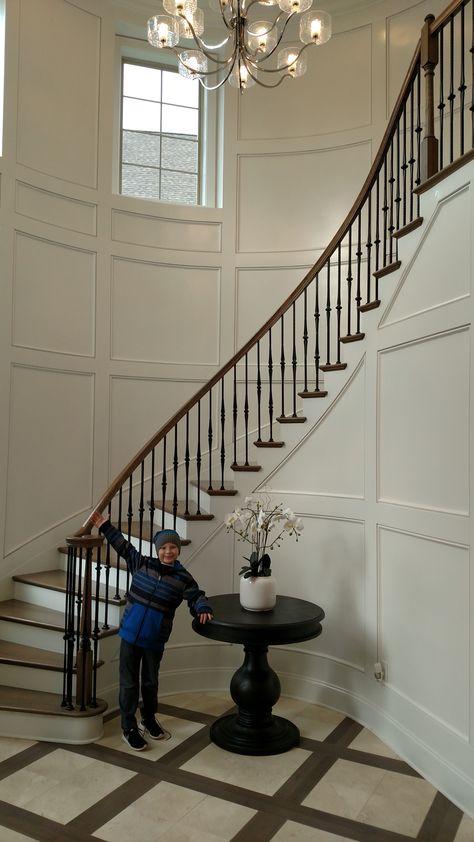 Wainscoting On Curved Staircase, Wainscoting Curved Stairs, Curved Staircase Molding, Decorating Curved Staircase Wall, Curved Stairs Entryway, Half Spiral Staircase, Curved Wall Paneling, Curved Wainscoting, Curved Staircase Wall Decor