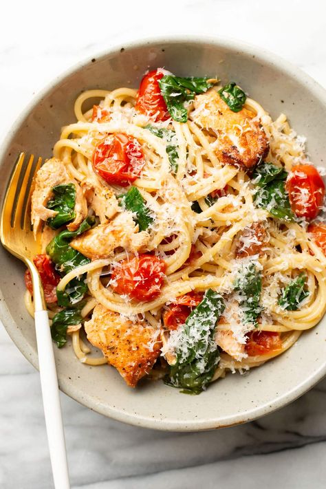 This easy yet elegant tomato spinach salmon pasta recipe has an irresistible garlic butter sauce with sun-kissed fresh tomatoes. The salmon is perfectly tender and flaky! Spinach Salmon Pasta, Salmon Pasta Recipe, Spinach Salmon, Salmon Pasta Recipes, Smoked Salmon Pasta, Salmon Spinach, Tomato Spinach, Seafood Pasta Recipes, Butter Salmon