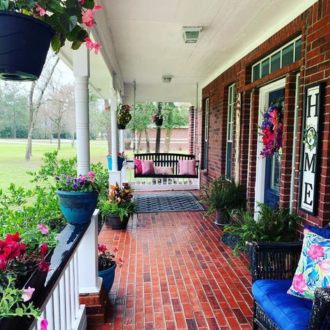 27 Red Brick House Front Porch Ideas - Home Decor Bliss Front Porch Decor Red Brick House, Brick House Front Porch Decor, Red Brick House Patio Ideas, Porch On Brick House, Wood Pillars Front Porch Red Brick House, Red Brick Front Porch Decor, Red Brick Home Landscaping, Brick House Porch Decor, Red Brick House Wrap Around Porch