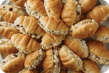 Chicken Salad Sandwich Display, Mini Croissant Sandwiches Party, Small Croissant Sandwiches, Chicken Salad Croissant Sandwich Mini, Croissant Platter Ideas, Chicken Salad Mini Croissants, Mini Sandwiches For Wedding, Chicken Salad Platter Ideas, Sandwich Platter Ideas Trays