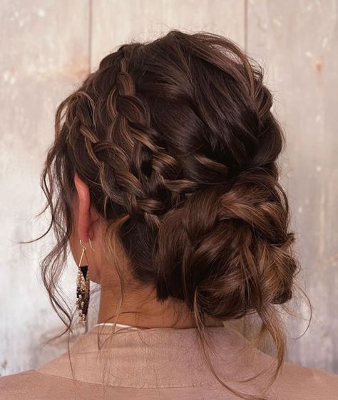 Messy Low Bun with Side Braids Wedding Low Messy Bun Hairstyles, Curly Bun With Braids, Low Bun Braid Hairstyles, Low Messy Bun Curly Hair, Two Side Braids, Low Curly Bun, Low Braided Bun, Low Bun Braid, Messy Bun Curly Hair