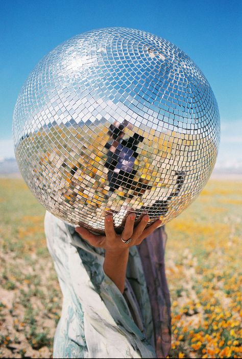 fixing the rest of my disco balls and hanging them outside. Great for keeping woodpeckers away from the house, and other nesting birds. Granola Bowl, Glitter Photography, Mirror Ball, Disco Balls, Disco Party, Oui Oui, Jolie Photo, Disco Ball, Photography Inspo