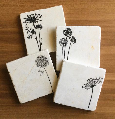 Each coasters measures 4x4 inches and is made of chic tumbled marble. The edges have a roughed up, rustic look and with the texture of the tumbled stone, no two coasters are the same!  A layer of lacquer is applied to the top to protect the design while a piece of cork is applied to the bottom to keep your surfaces safe.  All sets come with 4 coasters. These make a great gift and are a fun addition to your home décor! ** Because no two stone tiles are the same no two coasters are the same. It gi Hand Painted Coasters, Diy Coasters Tile, Painted Coasters, Floral Coasters, Plant Room, Flower Coasters, Modern Coasters, Ceramic Tile Coaster, Printed Coasters