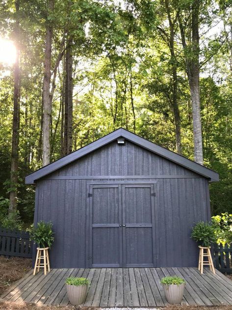 One Room Challenge Spring Backyard Makeover. Painted shed in dark color to have it blend well into the scenery. #diy #outdoor #shedideas #shed #backyard #backyardshed #oneroomchallenge #BestBackyardShedIdeas How To Finish The Inside Of A Shed, Cracked Pepper Behr Exterior, Behr Cracked Pepper Exterior Paint, Shed Paint Colours, Spring Backyard, Painted Garage, Black Shed, Painted Shed, Shed Landscaping