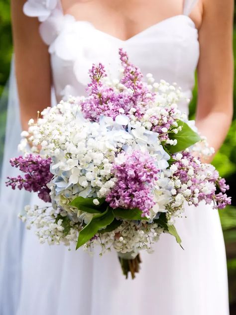 These bouquets will have you looking lovely in lilac. Ranunculus Wedding Bouquet, Lilac Wedding Bouquet, Lilac Bouquet, Purple Bridal Bouquet, Tulip Wedding, Romantic Bouquet, Lilac Wedding, Rose Wedding Bouquet, White Bridal Bouquet