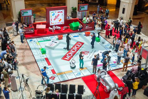 Giant Monopoly at Mall Of The Emirates Giant Monopoly, Corporative Events, Creative Marketing Campaign, Experiential Marketing Events, Guerrilla Advertising, Board Game Themes, Game Booth, Engagement Games, Exhibition Display Design