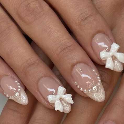 Almond Nails Designs Pearls, Acrylic Nail Designs With Pearls, Valentine Korean Nails, Aesthetic Wedding Nails, Korean Nails Bow, Croquette Nails Almond, Pearl Valentine Nails, Cuqoutte Nails, Nail Art With Accessories